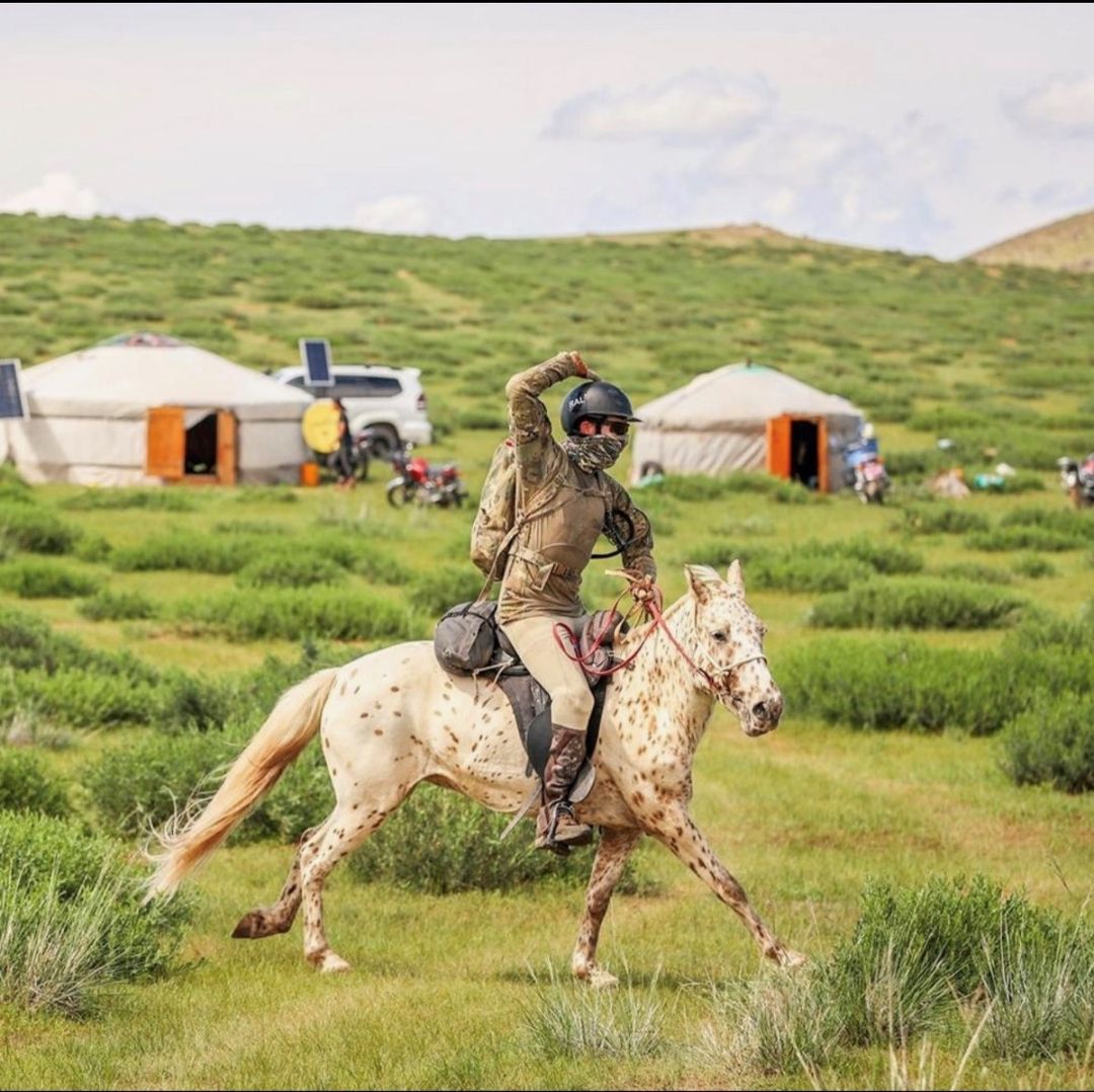Reid Albano in the 2023 Mongol Derby riding a spooky paint. Photo Credit Kathy Gabriel.