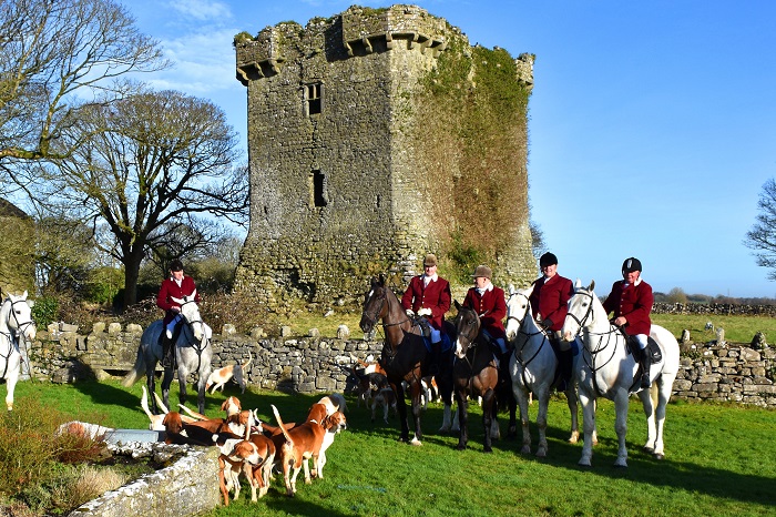  David Masterson huntsman of the North Galway Foxhounds with the masters Tom McNamara Michael Lennon and Jackie Lee with whipper in Gabriel Slattery at Shrule Castle built in 1238