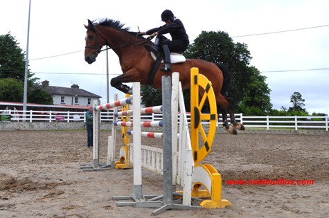 - Susan Oakes clears 5 foot 4 inches in training on Crannagh Clover with trainer Padraig Geraghty
