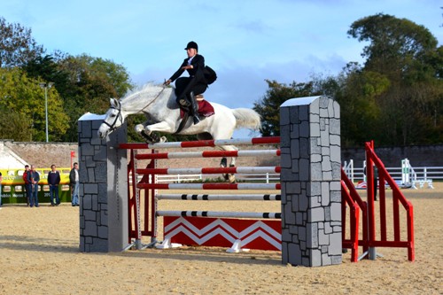 Susan Oakes jumping six feet four  half inches